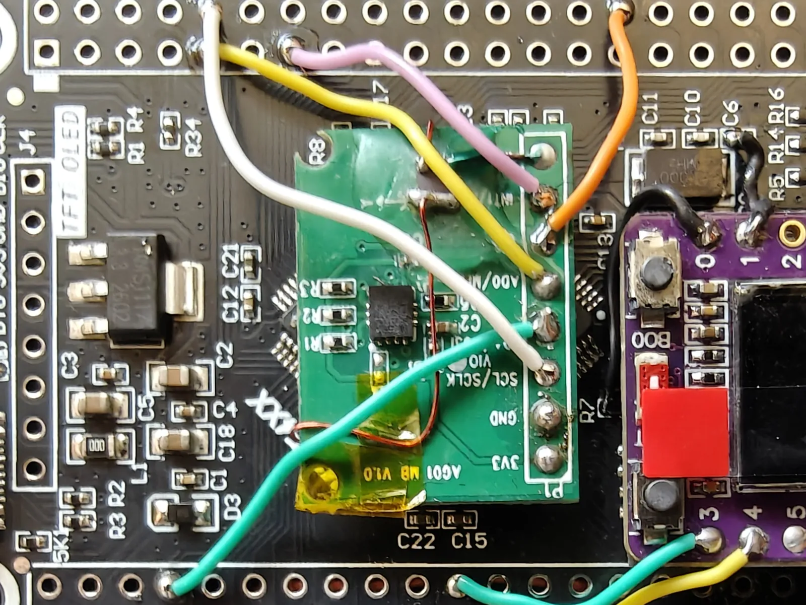 The five signal wires run from the IMU's P1 header across to the STM32, with the 3V3 and GND pads left bare