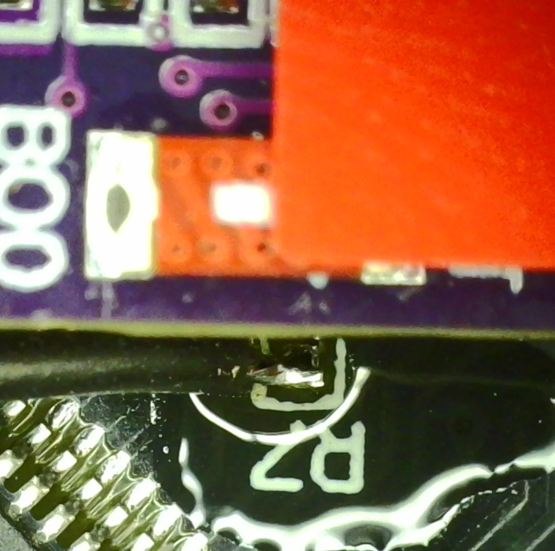 Wire soldered to R7, the BOOT0 pulldown